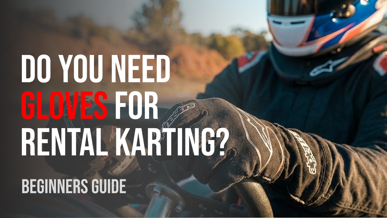 Racing gloves resting on a go-kart steering wheel